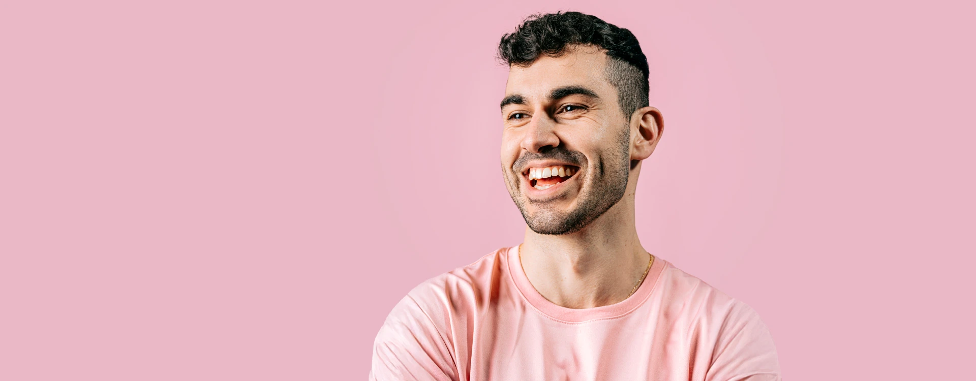 Happy Young Man On Pink Background