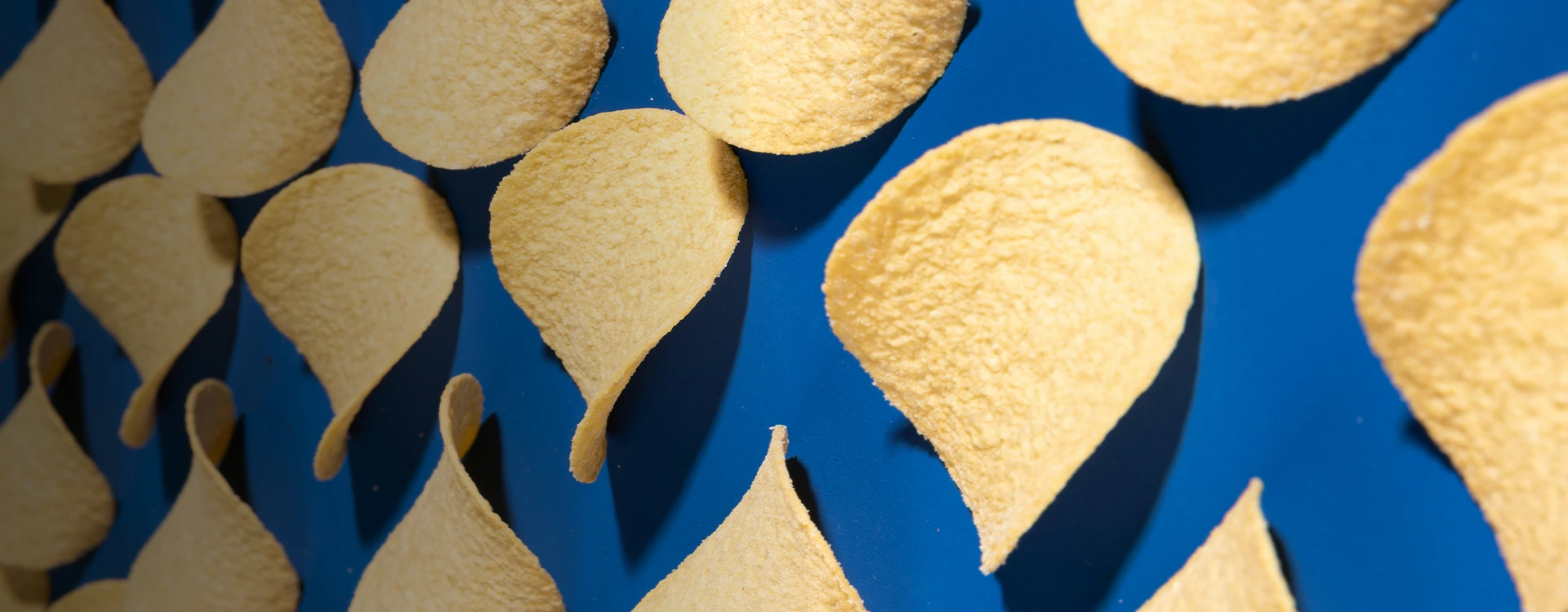 Pringles On A Blue Background