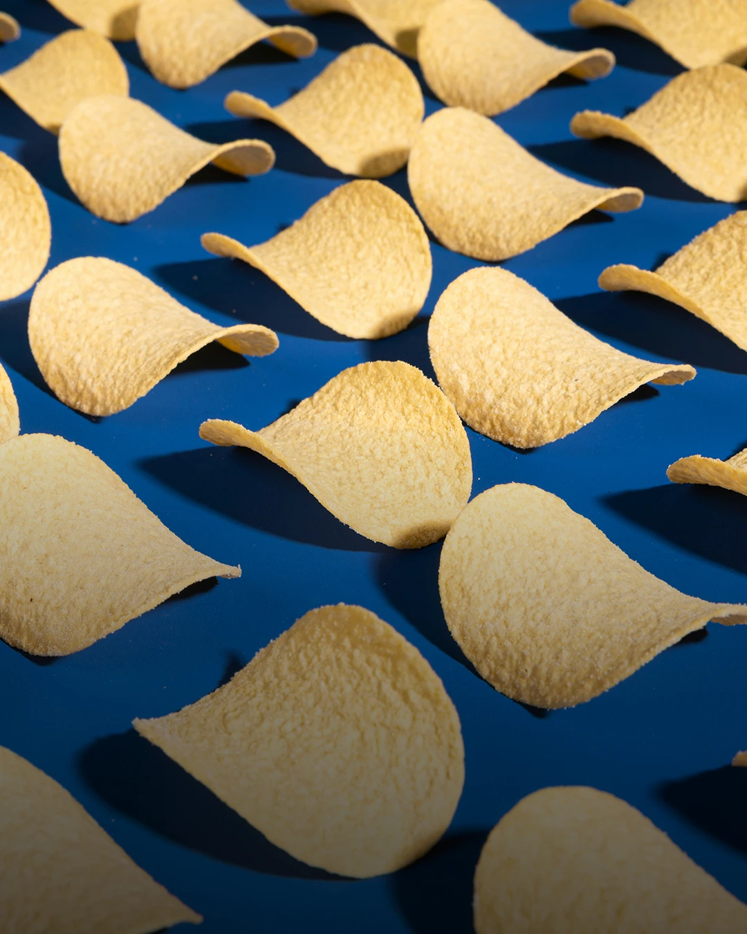 Pringles On A Blue Background